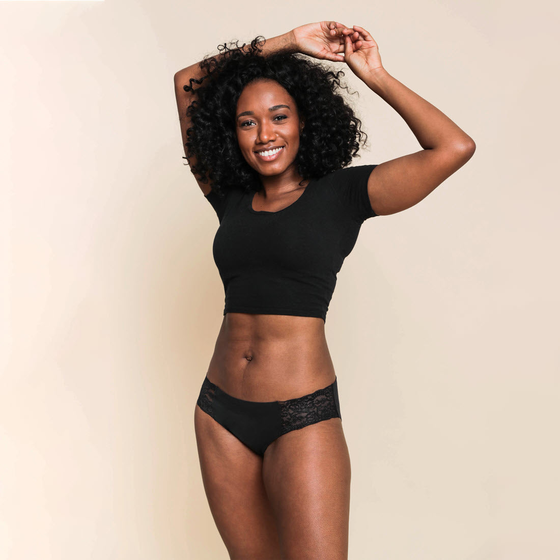 Woman in black sports bra and black panty photo – Free Underwear